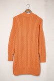 Cardigan orange ouvert sur le devant en grosse maille 