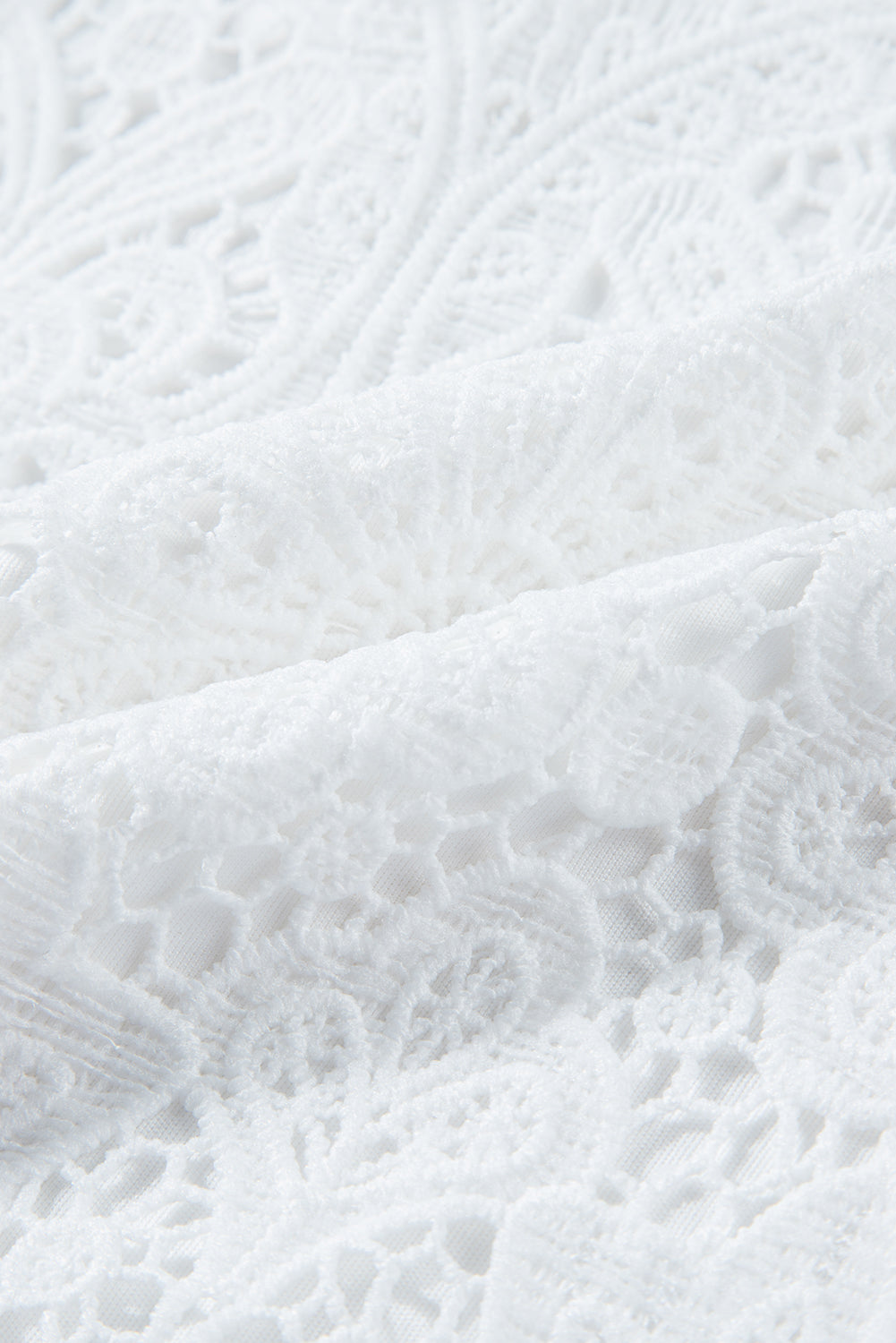 Chemisier blanc à manches courtes en dentelle au crochet