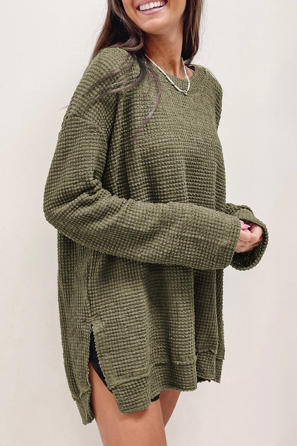 Haut oversize vert en tricot gaufré à fentes hautes