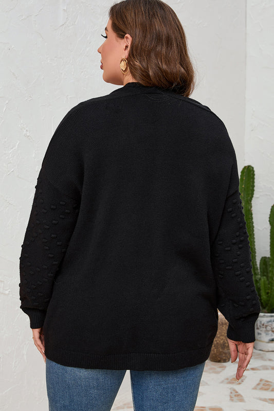 Cardigan noir ouvert sur le devant avec pompons grande taille