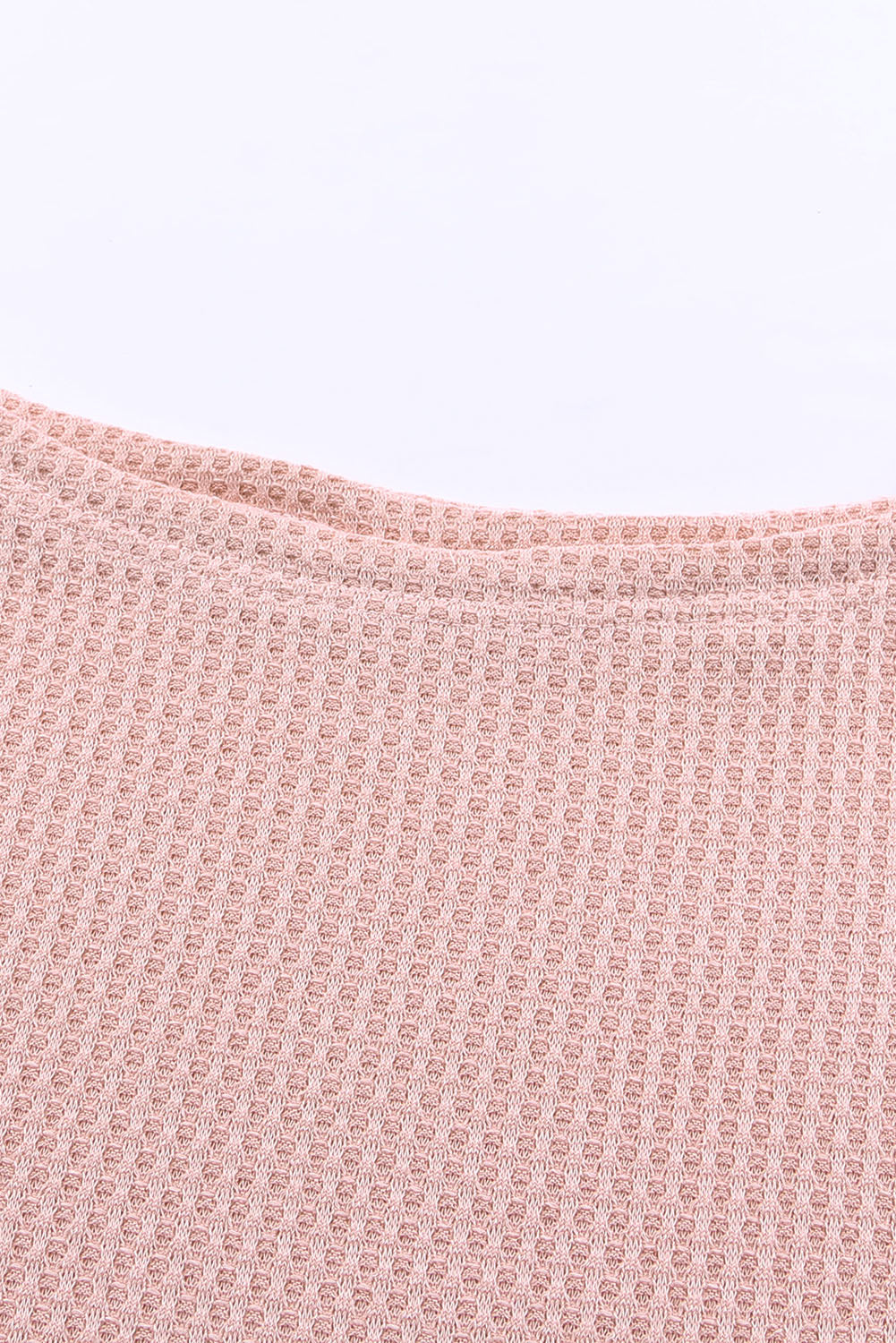 Haut en tricot gaufré rose à col large et droit