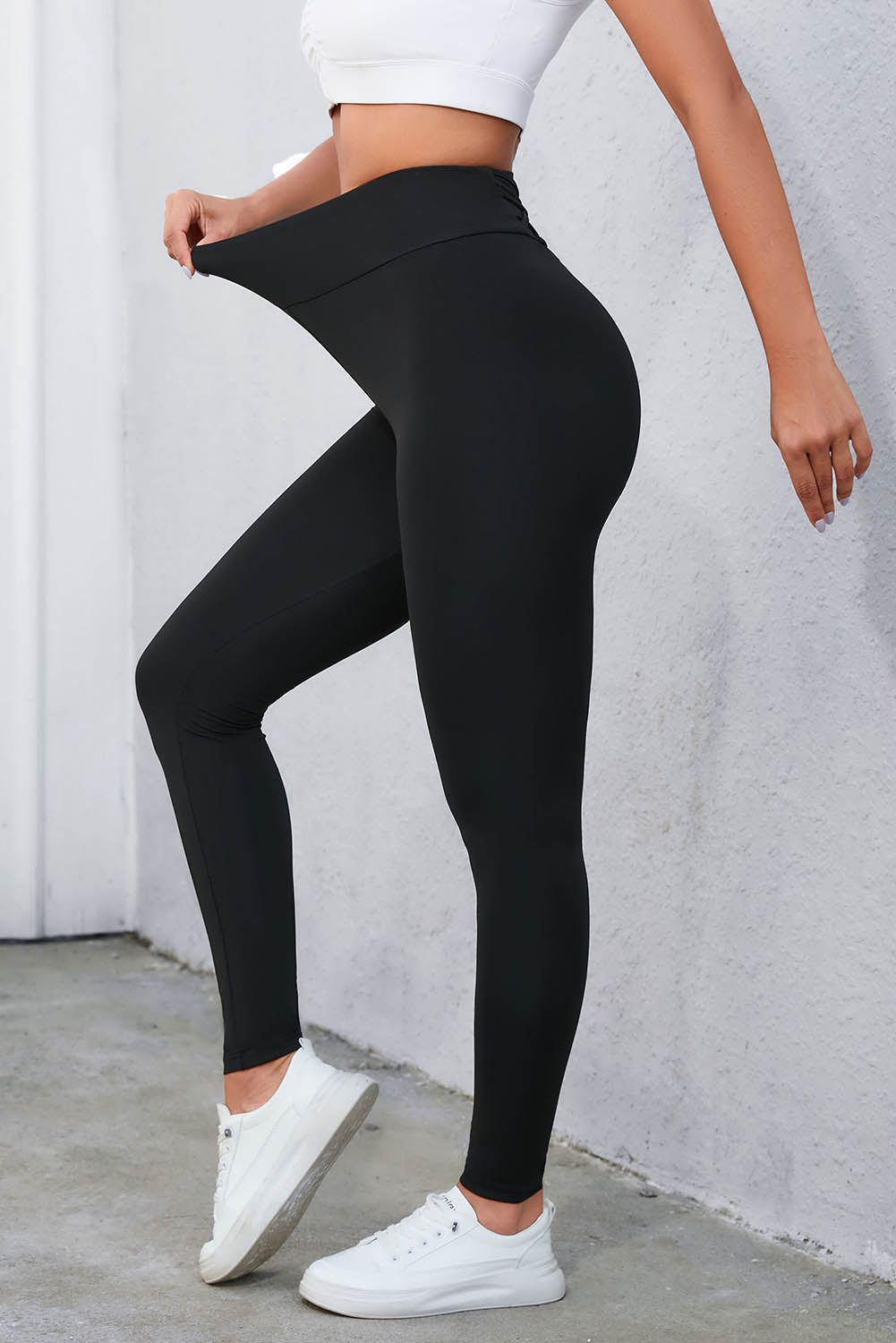 Legging taille haute noir croisé avec contrôle du ventre 