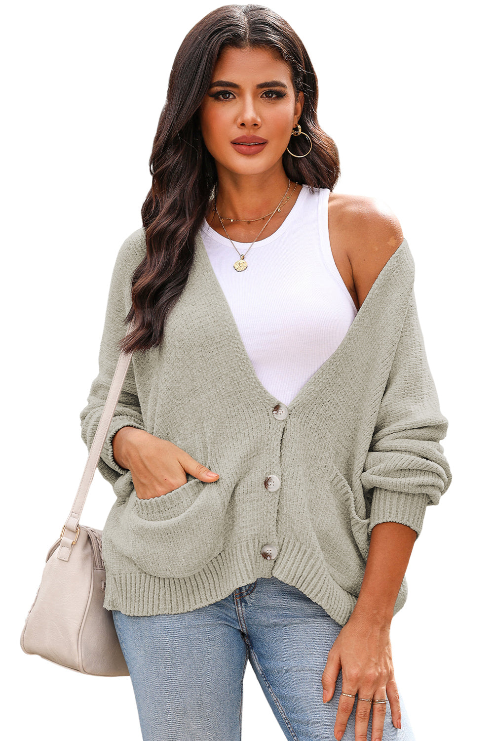 Cardigan pull gris avec poches sur le devant et boutons