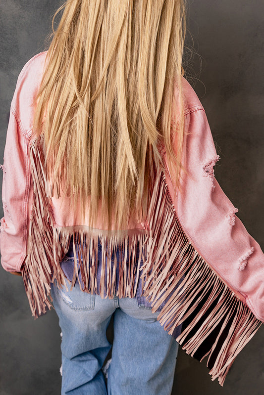 Veste en jean courte rose effet vieilli à franges