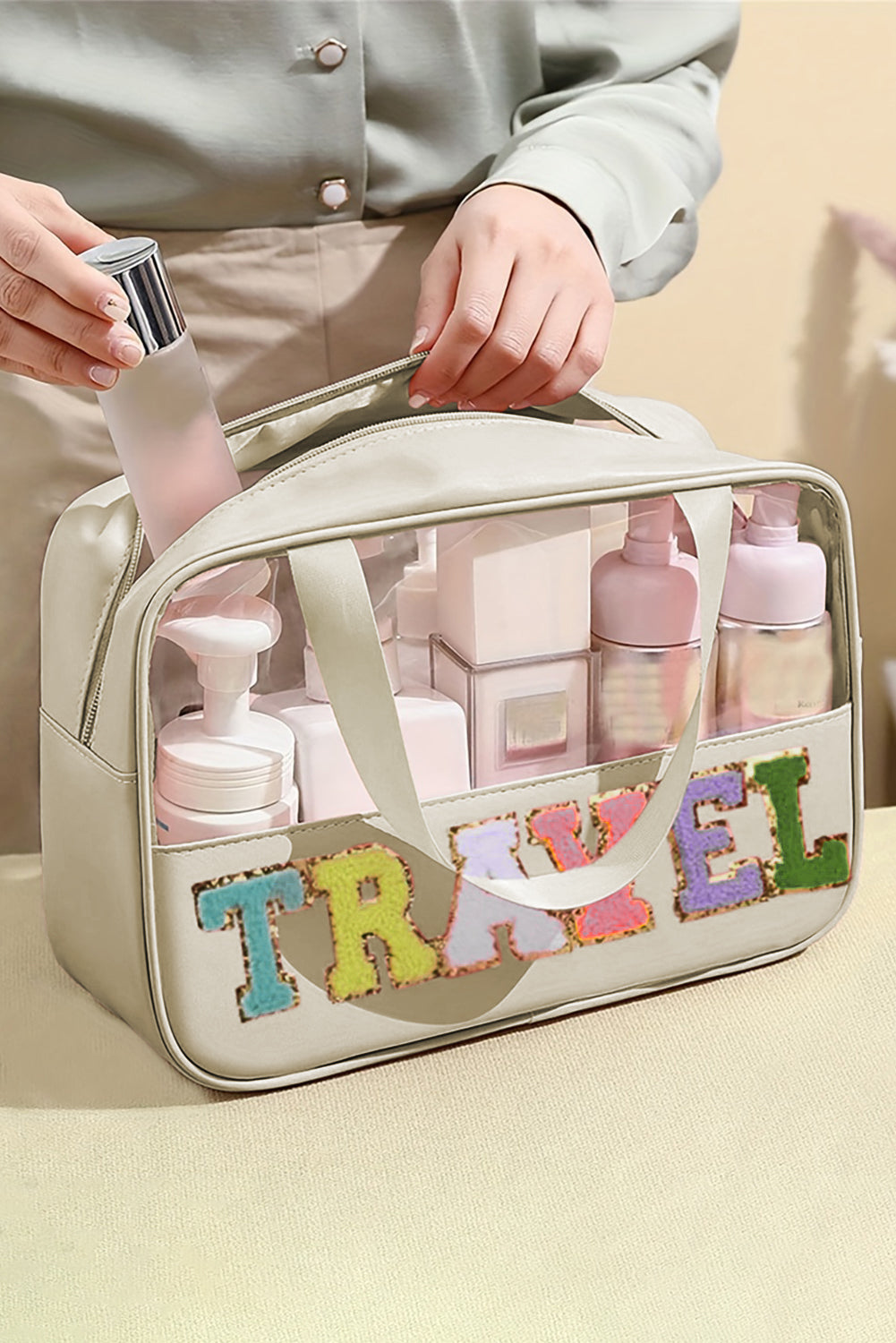 Trousse de maquillage en PVC transparent avec lettre chenille TRAVEL rose clair