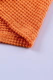 Haut en tricot gaufré color block léopard orange