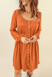 Robe orange boutonnée taille haute à manches longues