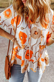 Blouse babydoll orange à imprimé floral et col volanté 