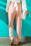 Pantalon taille haute rose à volants et ceinture élastique