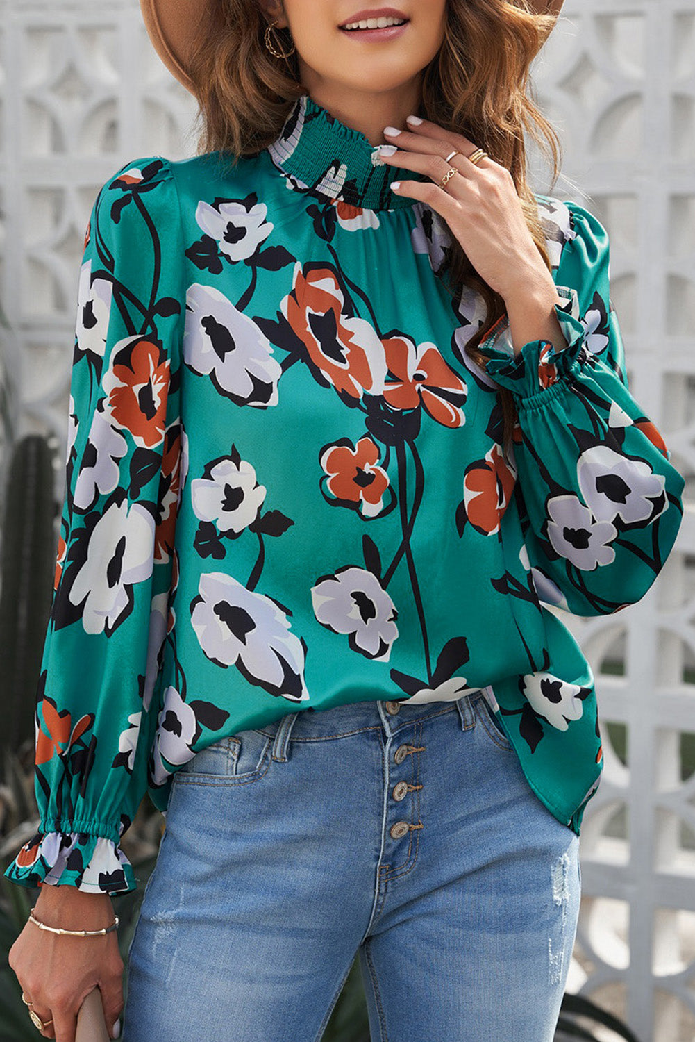 Blouse smockée à col montant et imprimé floral