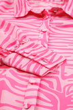 Chemise rose à manches lanterne et imprimé zébré