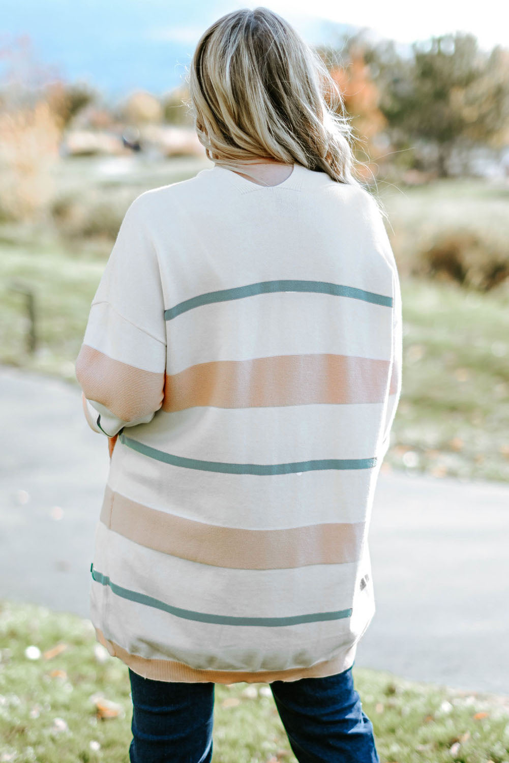 Cardigan blanc à rayures en tricot avec poches latérales grande taille