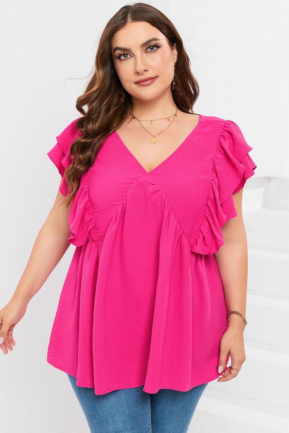 Blouse rose froissée à volants et col en V grande taille