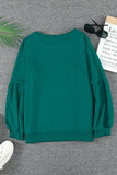 Sweat-shirt vert à manches raglan et patchwork