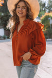 Blouse orange plissée à volants et boutonnée à col en V