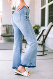 High Waist Buttoned Distressed Flared Jeans