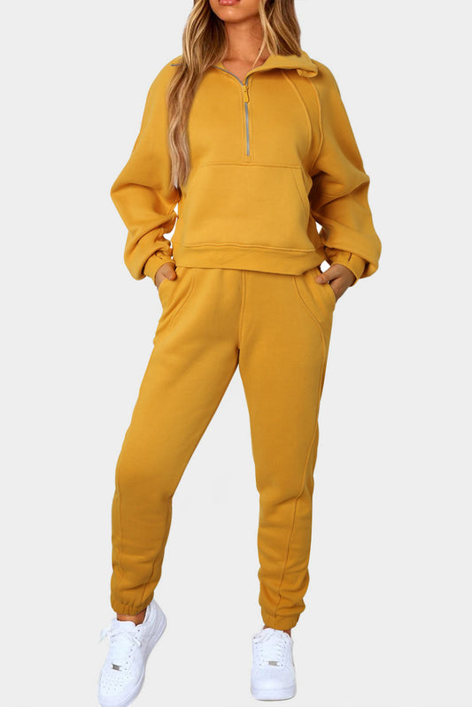 Ensemble de sport jaune avec sweat-shirt et pantalon de survêtement à demi-zip 