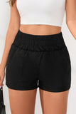 Short noir taille haute élastique avec poches latérales