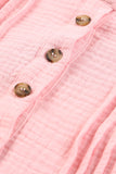 Blouse rose plissée en tricot gaufré à moitié boutonné