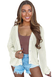 Cardigan beige uni en tricot évidé boutonné sur le devant