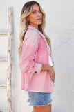 Veste chemise rose avec poches et col rabattu