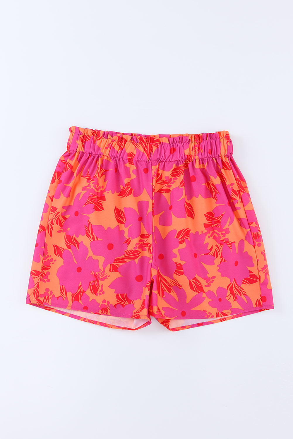 Short rose à taille smockée et imprimé floral