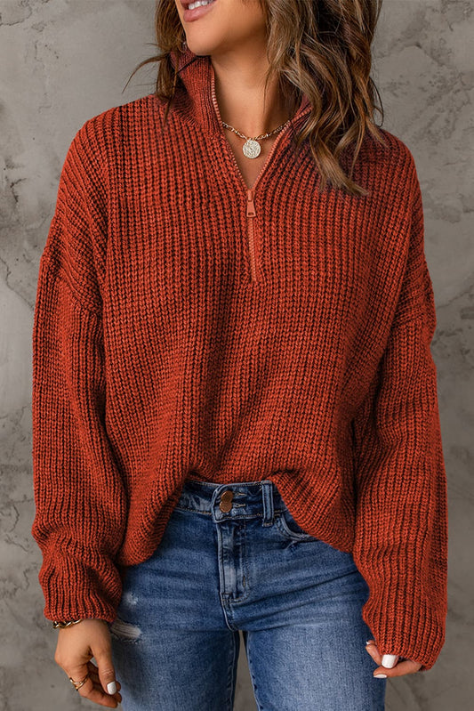 Pull en tricot zippé rouge à col roulé et épaules tombantes