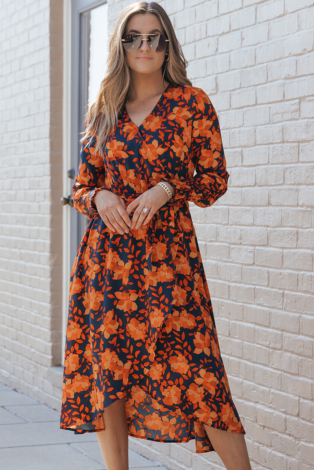 Robe portefeuille orange à imprimé floral et ceinture