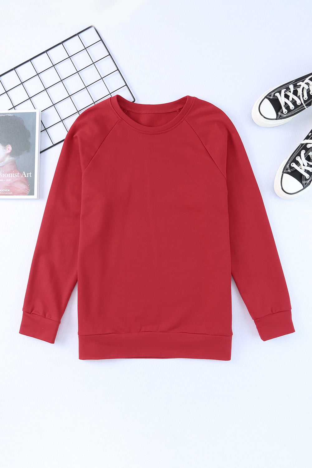 Sweat-shirt rouge uni à col rond et manches raglan 