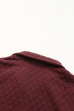 Sweat-shirt rouge à texture géométrique et bordure à carreaux