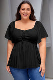 Haut babydoll noir froncé sur le devant de grande taille