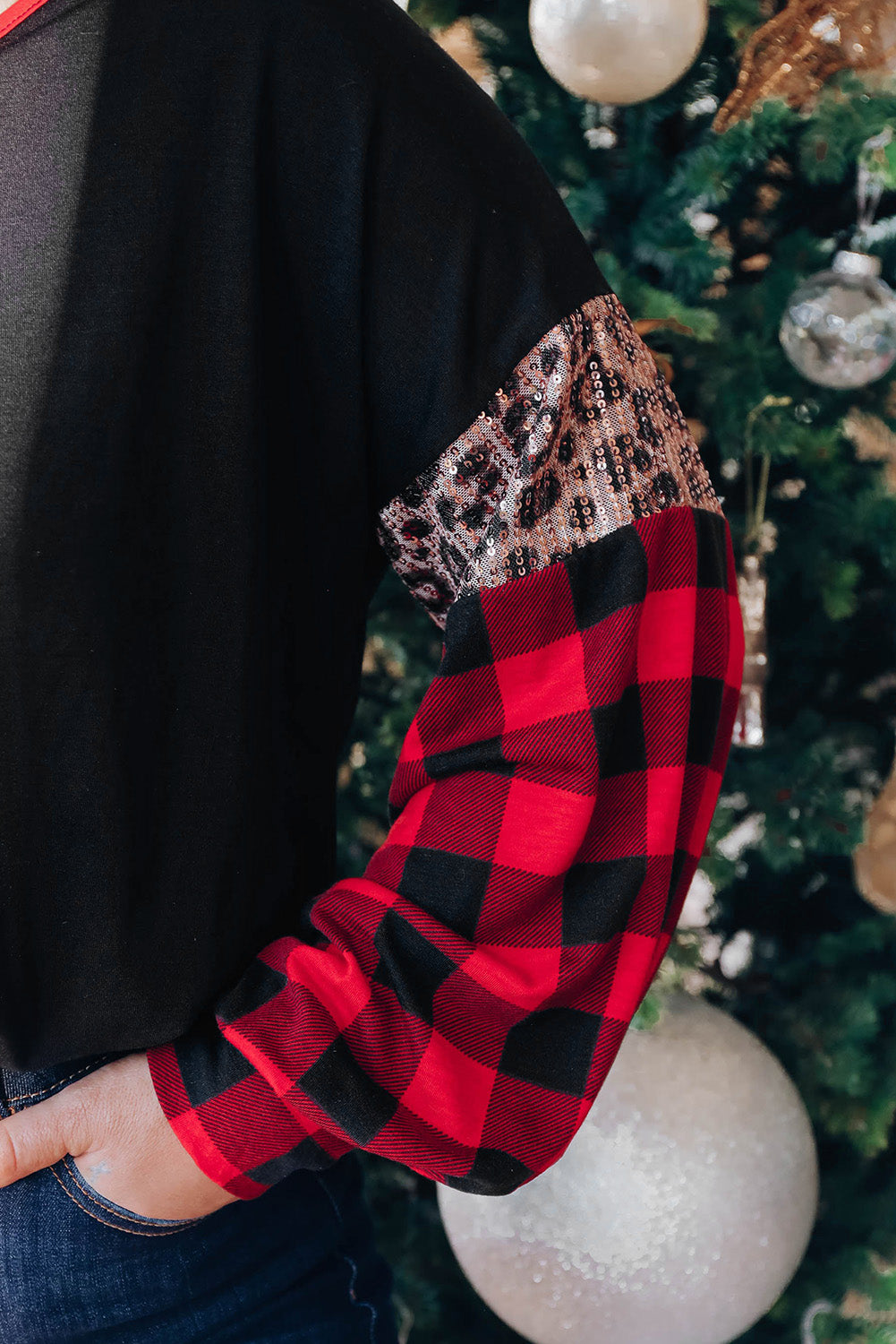 Haut noir à sequins léopard à carreaux et motif sapin de Noël de grande taille