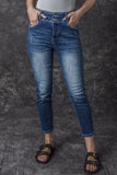 Jean skinny taille haute bleu délavé vintage à deux boutons 