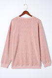 Sweat-shirt rose uni en tricot côtelé à col rond