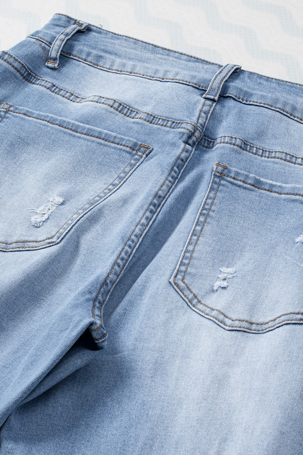 Sky Blue Buttoned Pockets Distressed Jeans