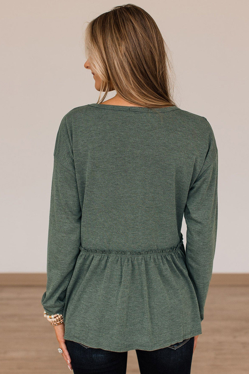 Outseam Detail Long Sleeve Peplum Top