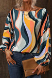 Blouse à manches bouffantes et col bateau à rayures ondulées multicolores