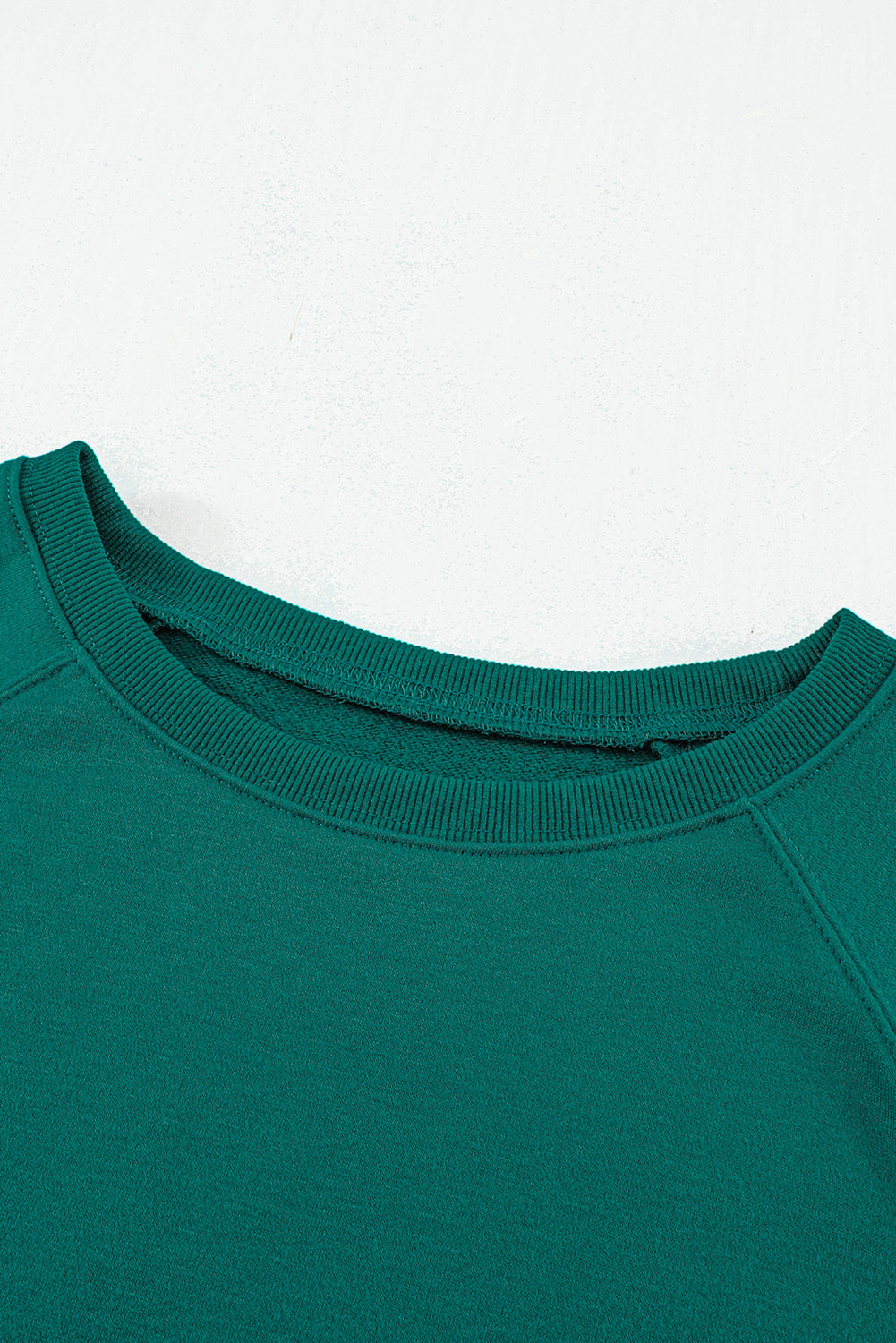 Sweat-shirt vert à manches raglan et patchwork