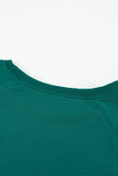 Sweat-shirt vert à manches raglan et patchwork