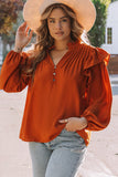 Blouse orange plissée à volants et boutonnée à col en V