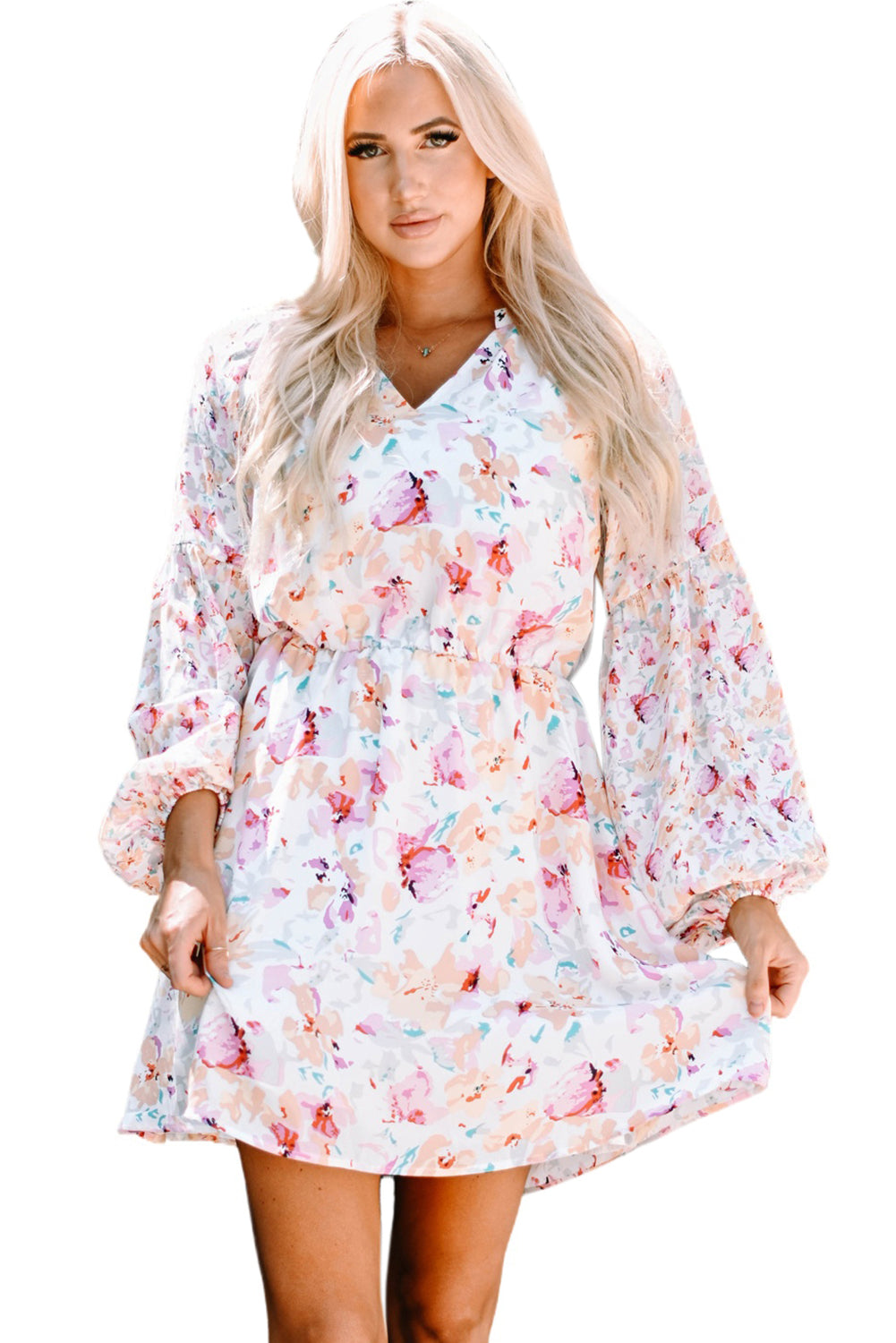 Robe florale rose à col en V et manches bouffantes