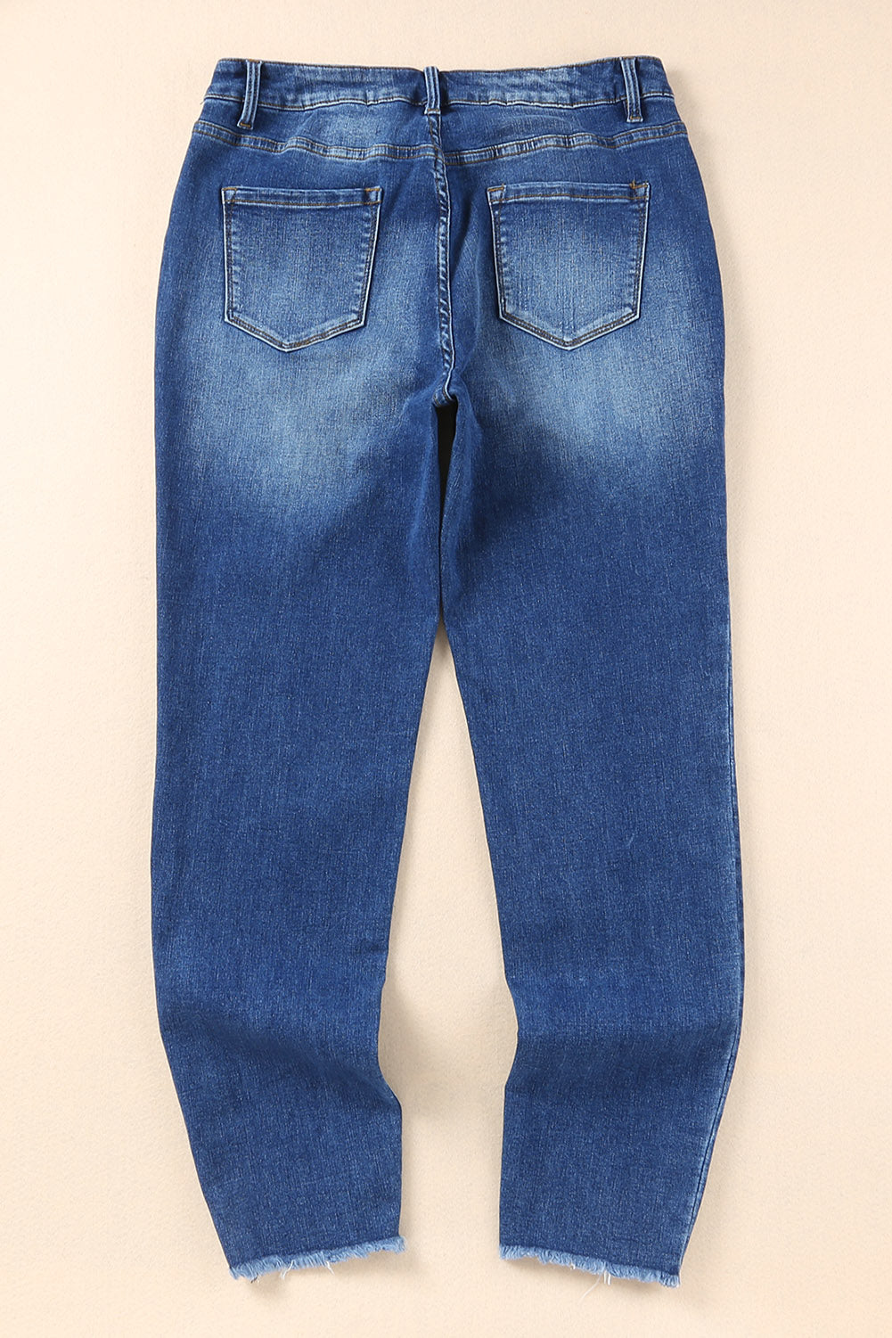 Jean skinny bleu longueur cheville à ourlet brut