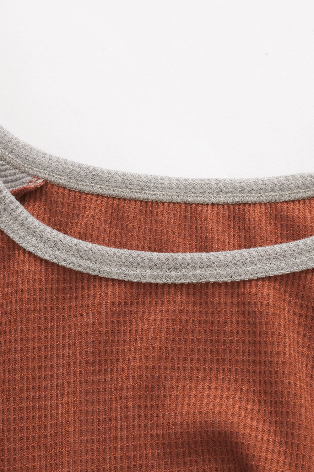 Blouse orange en tricot gaufré à manches longues léopard avec nœud torsadé