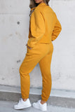 Ensemble de sport jaune avec sweat-shirt et pantalon de survêtement à demi-zip 