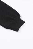 Chemise décontractée boutonnée en tricot gaufré noir